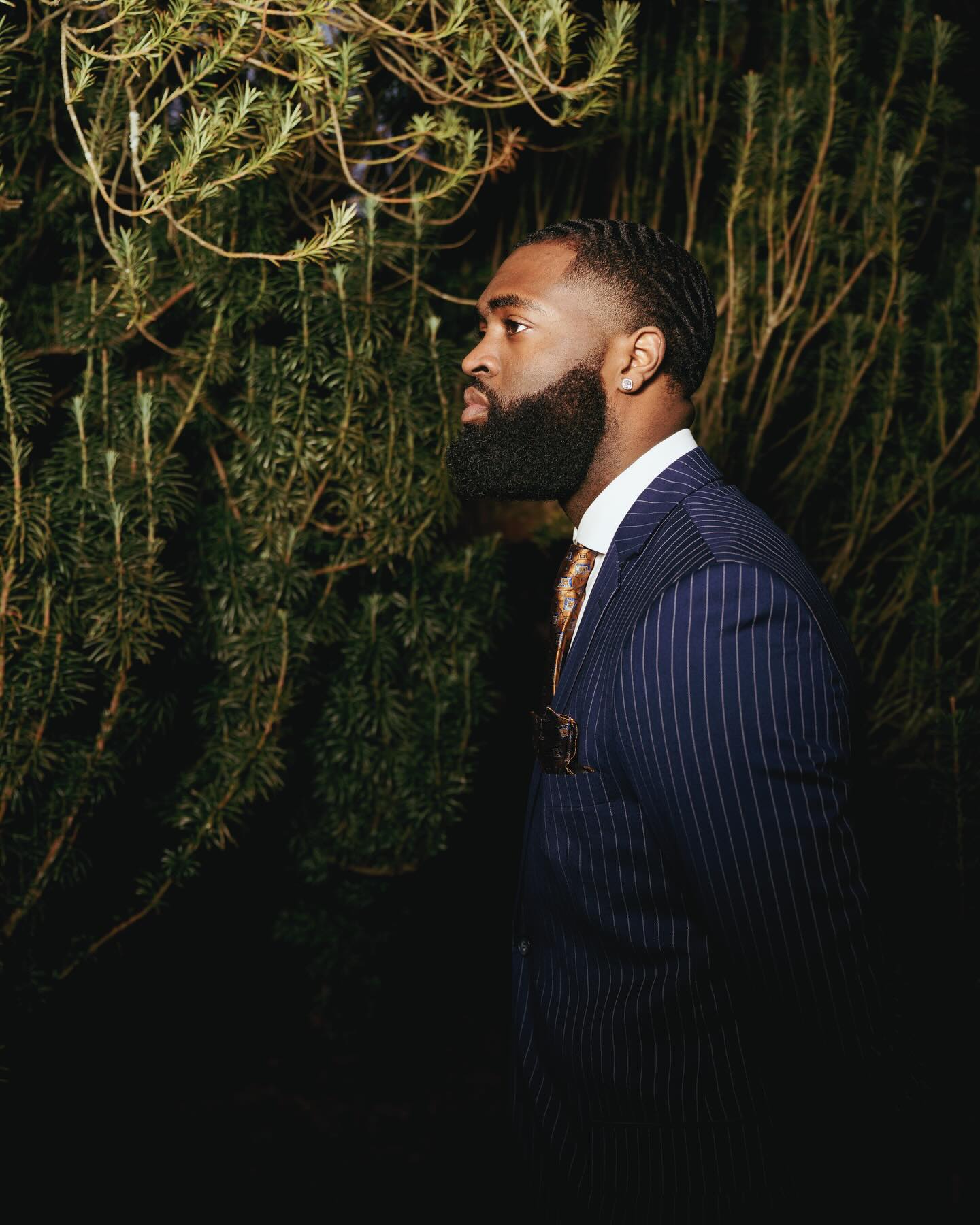DMC member in a suit