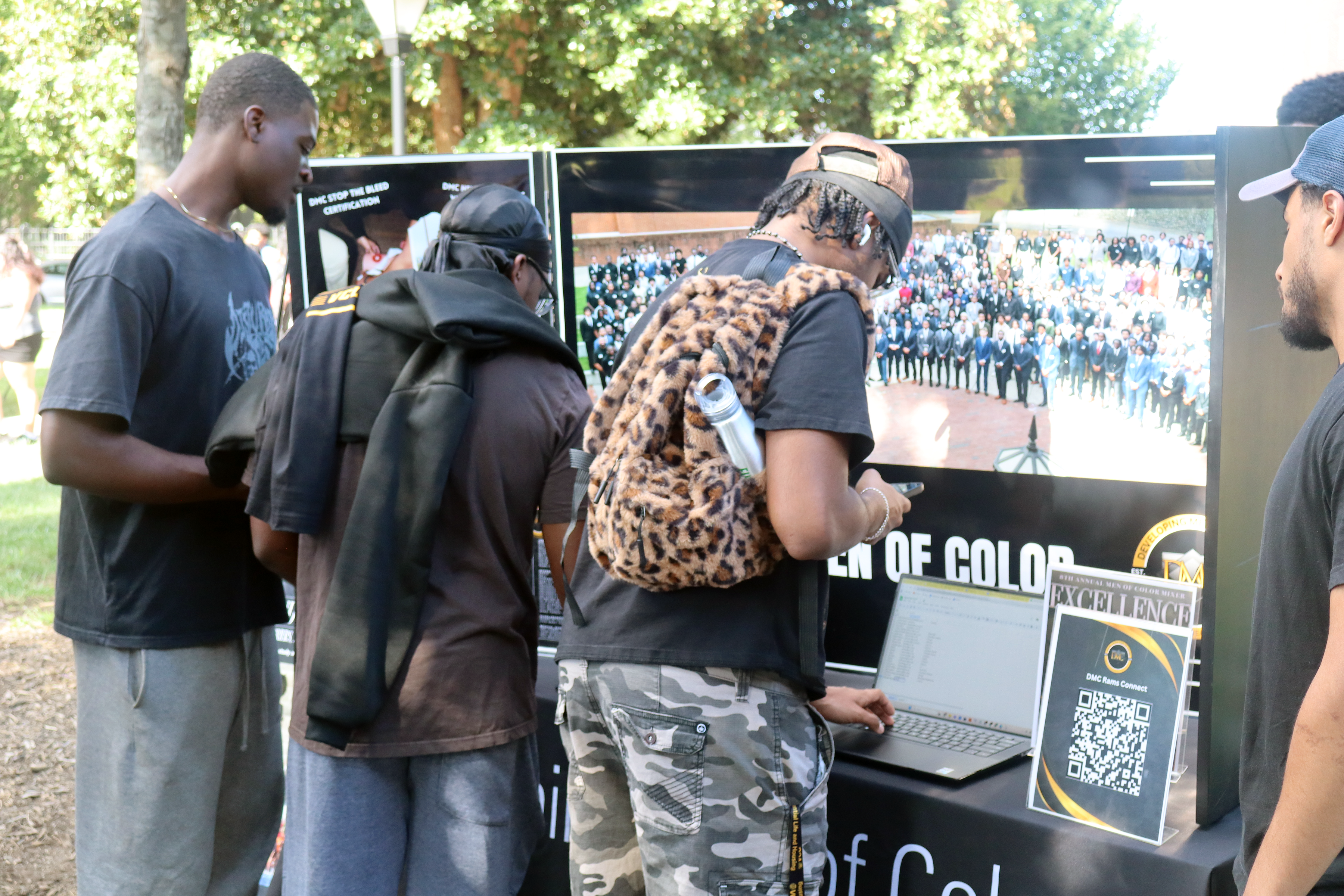 DMC members connecting with students on campus